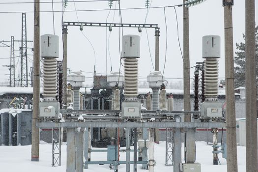 High voltage electric power substation in winter day