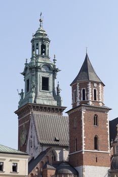 view on clock tower of Wawel Royal Castle in Cracow, Poland
