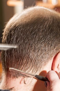 Baldness alopecia or hair loss - at the hair dresser