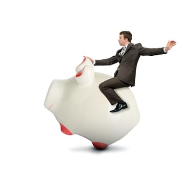 Businessman riding piggy bank isolated on white background, business concept