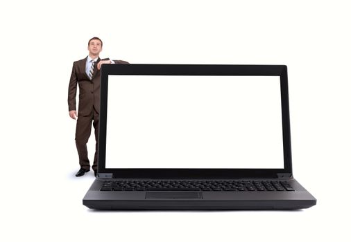 Businessman near big laptop with blank screen isolated on white background, technology concept