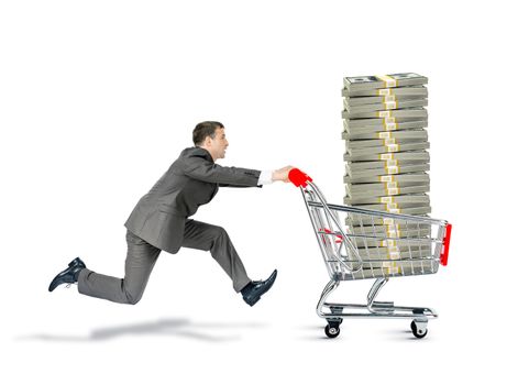 Businessman pushing shopping cart with money isolated on white background