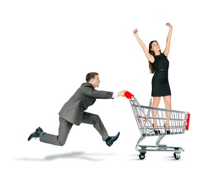 Businessman pushing shopping cart with business lady isolated on white background