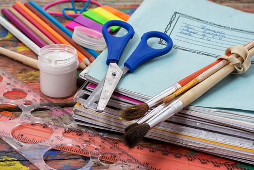 Pen and notebook tool a first grader to school