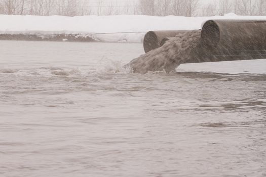 Dirty water discharged into the river, pollution