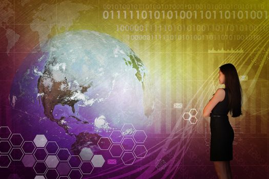 Businesswoman in front of world map with graphical charts, business concept