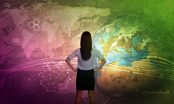 Businesswoman in front of world map with graphical charts, business concept