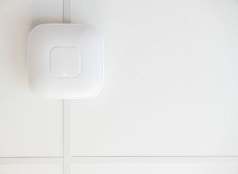 A High Speed Wifi Access Point On A Ceiling With Copy Space
