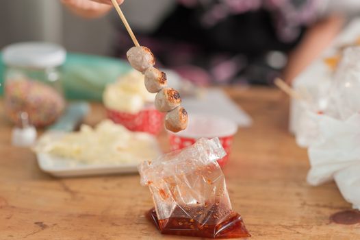 Thai style grilled meat ball with spicy dressing. Thai street food