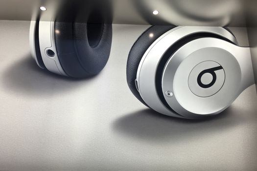 Beats Earphones, inside Apple Store in New York City, STATES AMERICA - FEB 23 2016: Beats earphones displaying on a poster inside Apple Store, New York, USA