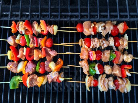 Barbecue grill with meat and vegetable skewers. Outdoor bbq.