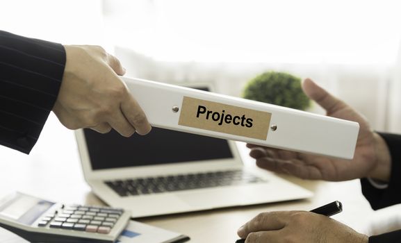Staff presented the project to the executives. select focus.