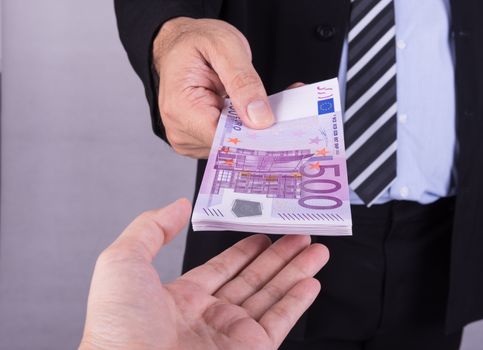 Bank officer give euro banknotes money. finance concept.