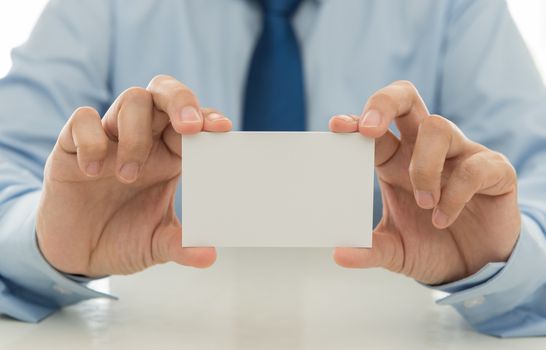 Sales show a business card to introduce itself to customers. free space for text.