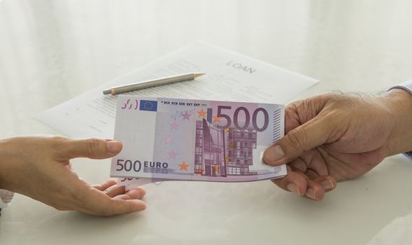 Business loan from a bank employee. finance concept