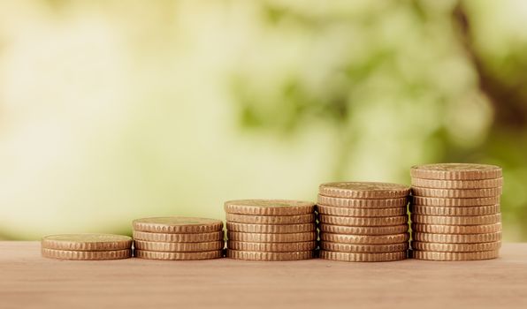 golden coins on nature background.  success in business concept. vintage style.