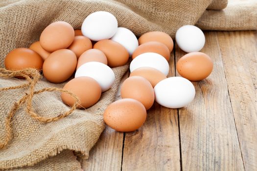 Eggs on wooden background