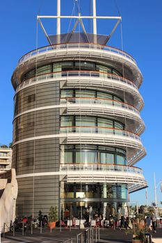 Monte-Carlo, Monaco - January 12, 2016: Side view of the Luxurious Building of the Yacht Club of Monaco. Port Hercules in the south of France