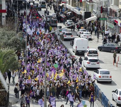 TURKEY, Izmir: Protesters wave flags during a demonstration held in Izmir, Turkey on March 6, 2016 prior to International Women's Day (March 8).
