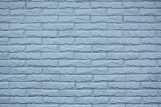 Blue brick wall in the countryside