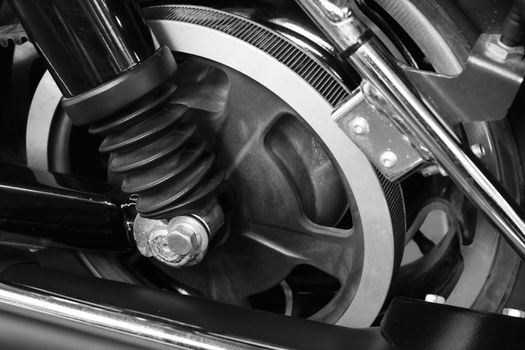 Close up belt drive wheel in the motorcycle black and white style
