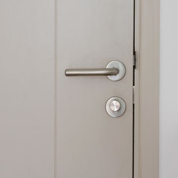 Modern style door handle on grey door