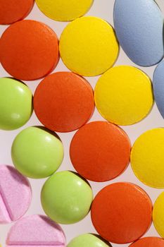 background of colorful medical pills.