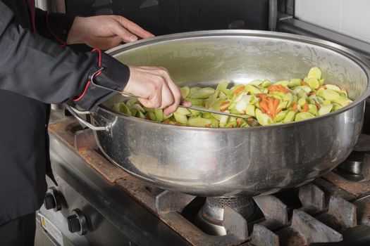 chef cooking at commercial kitchen