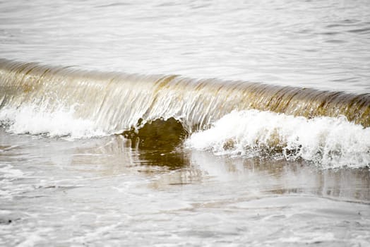 crisp waves lashing onto ballybunion beach in county kerry ireland