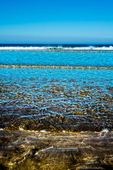 calm soft waves lashing onto ballybunion beach in county kerry ireland