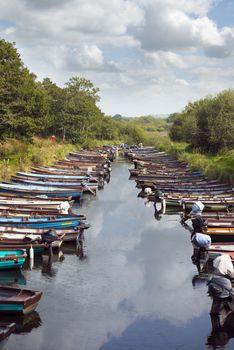 rowing boats moored at ross castle in killarney county kerry ireland