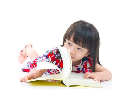 Asian girl reading a book

