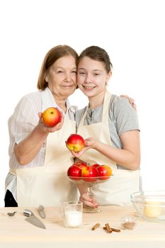 the grandmother and the granddaughter choose apples for pie