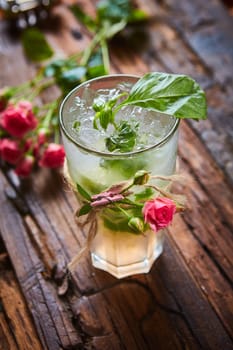 fresh mojito on a rustic table. Shallow dof