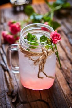 fresh mojito on a rustic table. Shallow dof