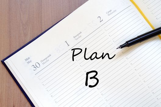 Plan b text concept write on notebook with pen