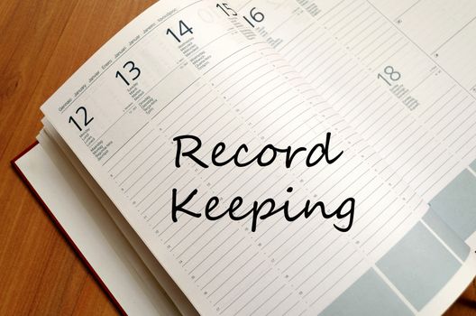 Record keeping text concept write on notebook