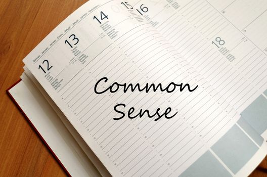 Common sense text concept write on notebook