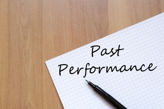 Past performance text concept write on notebook with pen
