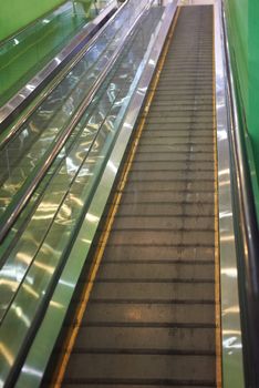 Empty escalator steps on staircase in the airport