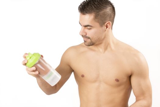 sport, fitness, healthy lifestyle and people concept - close up of man with jar and bottle preparing protein shake