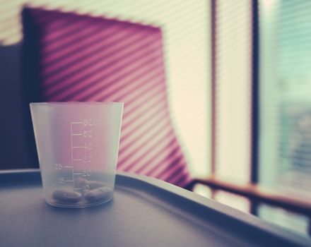 Retro Style Image Of Medication In A Hospital Room