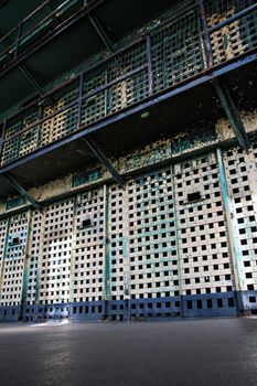 Multiple story prison cells all locked up