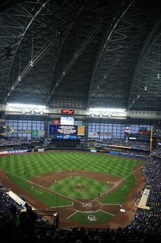 Milwaukee Brewers and Chicago Cubs battle under a closed dome baseball game at Miller Park.
