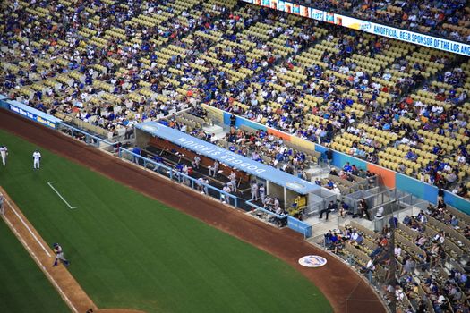 The New York Mets watching from the dugout at a baseball game at Dodger Stadium, home of the Los Angeles Dodgers