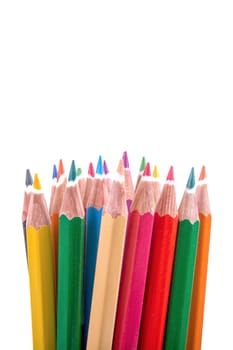 Colored pencils on the white background