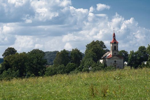 Small abandoned church in the beautiful landscape