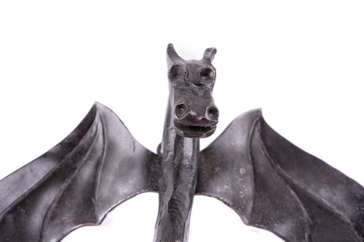 Forged dragon isolated on a white background