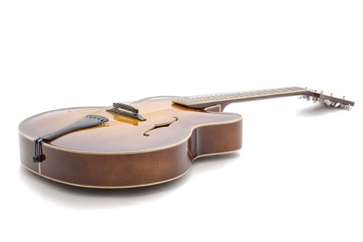 Handmade  jazz guitar isolated on a white background