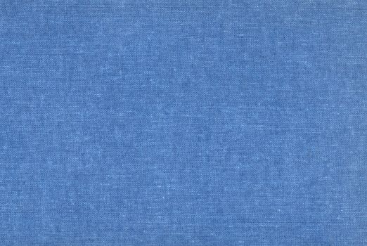 Blue knitted fabric texture closeup, useful as background